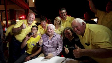 Mining magnate Clive Palmer with his supporters on the Sunshine Coast.