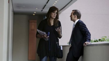 Woman of influence: Peta Credlin and Tony Abbott in Brisbane, shortly before the Coalition's 2013 federal election campaign launch.