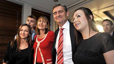 That’s all, folks! Premier John Brumby with his wife, Rosemary, and family after conceding defeat in the state election.
