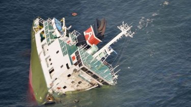 Japanese tanker the Shoko Maru sinks after it exploded in waters off Himeji port, western Japan. The captain is the only crew member not accounted for.