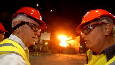 Prime Minister Malcolm Turnbull and manager slab making Sam Gerovasilis during his tour of Bluescope. RE, Prime Minister Malcolm Turnbull visited Bluescope Steel Port Kembla along with Minister for the Environment and Energy, Josh Frydenberg.