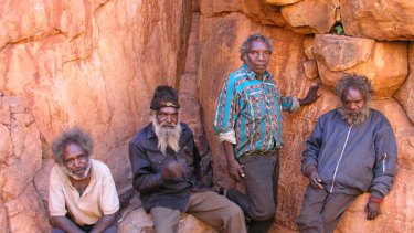 Heritage: Birriliburu custodians at a waterhole near the Canning Stock Route.