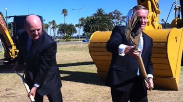 Planning Minister John Day and Premier Colin Barnett turn the first sod on Perth's Waterfront project.