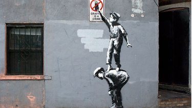 Whited out: Banksy art, titled <i>The Street Is In Play</i>, survived less than a day in New York.