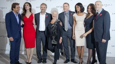 New film .... director Sam Mendes, third from left, with actors, from left, Javier Bardem, Berenice Marlohe, Dame Judi Dench, Daniel Craig, Naomi Harris and producers Barbara Broccoli and Michael G. Wilson.