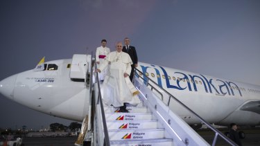 Pope Francis arrives for the first papal visit to the Philippines in 20 years.
