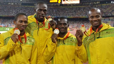 Jamaica's 2008 men's 4x100 relay team, including Usain Bolt &amp; Nesta Carter (centre).
