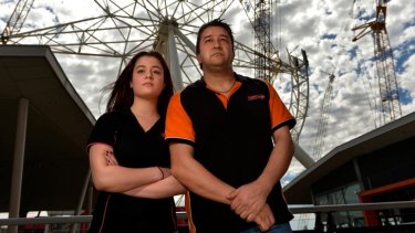 Chris Kalpis, owner of Tunzafun at Harbour Town, and assistant Elizabeth Cugliari are upset about constant delays in setting the Southern Star wheel back in motion.