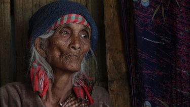 People power: Spility Langrin Lyngdoh, 81, sits in her home at Domiasiat, north-east India. The government wants her land to mine for uranium but she is refusing to sell.