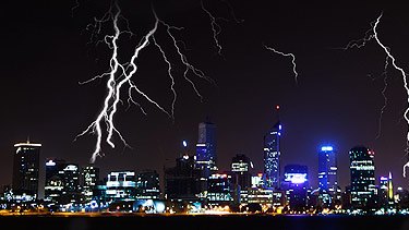 Lightning crashes over the Perth city skyline as the storm rages through.