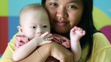 Pattharamon Janbua has been left caring for Gammy, a sick baby that is not her own.