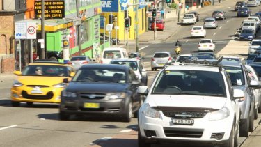 Benefit in doubt: traffic on Parramatta Road near Leichhardt.