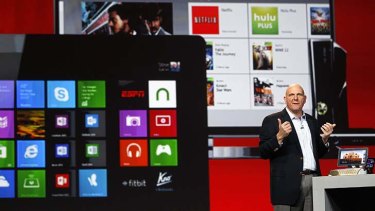 Microsoft CEO Steve Ballmer shows off Windows 8 devices.