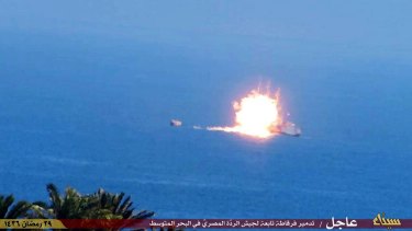 This image posted on a militant social media account affiliated with the Egyptian branch of Islamic State shows a fireball rising from an Egyptian Navy vessel.