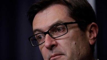 Climate Change Minister Greg Combet is doing the hard sell on compensation for taxpayers under a carbon tax.