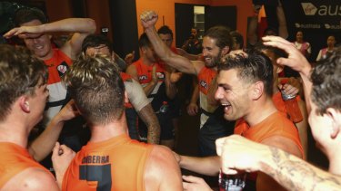 SYDNEY, AUSTRALIA - MAY 22:  The Giants celebrate after the round nine AFL match between the Greater Western Sydney Giants and the Western Bulldogs at Spotless Stadium on May 22, 2016 in Sydney, Australia.  (Photo by Ryan Pierse/Getty Images)