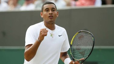 Nick Kyrgios celebrates winning a point against Richard Gasquet of France.