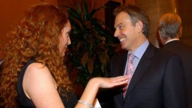 Influence: Former British prime minister Tony Blair and former News International chief Rebekah Brooks in 2004.