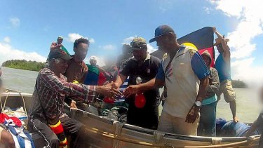 Australian organisers of a pro-West Papuan separatist campaign say boats from both countries met 'near the Australian-Indonesian border' to exchange symbolic items.
