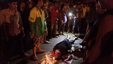 Deadly protests: The body of a protestor who died after being allegedly shot by riot police  on September 15, 2013 in Phnom Penh