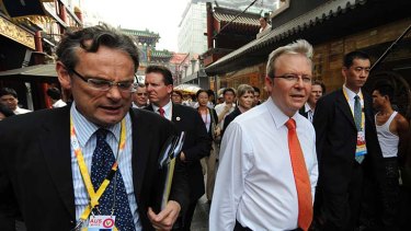 Speaking frankly ... the Australian ambassador to China Geoff Raby (left) walks through central Beijing with the then Prime Minister Kevin Rudd in 2008.