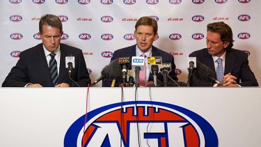 FACING FACTS: Essendon press conference with (from left) CEO Ian Robson, president David Evans and coach James Hird.