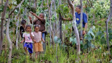 New shoots: Tony Rinaudo with Manuel Da Silva and some of his children near Aileu in East Timor.