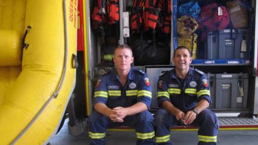 Firefighters Andrew Neil and Brad Mills ... saved 15 people on January 10.
