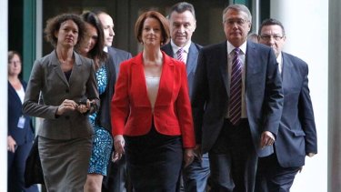 Julia Gillard with leading members of the Labor caucus after yesterday's decisive win over Kevin Rudd in the leadership ballot.