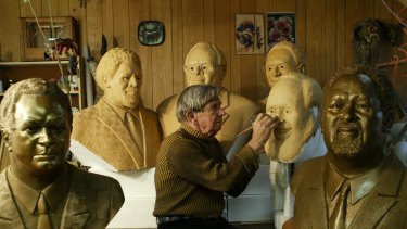 Artist Hal Holman with his busts of former PNG prime ministers. His paintings and drawings are in private collections and in galleries around the world.