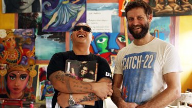 Prize-winning artist Ben Quilty (right) shares an insight with Bali nine member Andrew Chan.