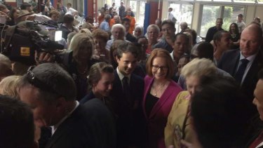 Prime Minister Julia Gillard amid the throngs at Marsden State High School in Brisbane's south.