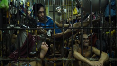 Prisoners inside a cell in Manila Police Headquarters, Philippines.
