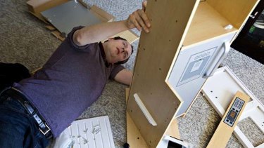 Master builder: Brad Fremmerlid is an expert at putting together furniture.