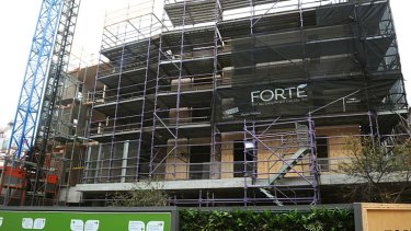 Leading the way: work proceeds on the Forte timber apartment building at Docklands.