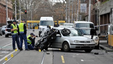 stolen motorcycle car into smashes fitzroy investigate gertrude crash police scene street where rider critically injuring hit speed