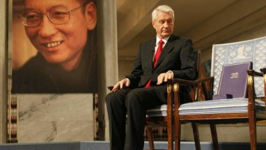 Norwegian Nobel Committee Chairman Thorbjoern Jagland sits next to empty chair during the ceremony to honour prize winner Liu Xiaobo in 2010.