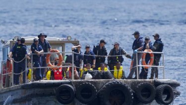 "The cost of detaining and assessing asylum seekers has risen to $1.06 billion in this year's budget, because of the surge in boat arrivals last year."