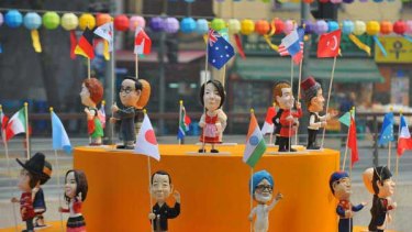 Dolls of leaders participating in the G20 summit on display at the Seoul Lantern Festival at the Cheonggye stream in Seoul.