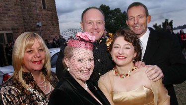 Tony Abbott at the wedding of Sophie and Gregory Mirabella, at Holy Trinity Anglican Church in Wangaratta in 2006, alongside Bronwyn Bishop and another wedding guest.