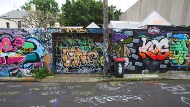 Ugly "tags", above, are an unwanted byproduct of the legal art in May Lane, say  residents, who are calling on the council to act against the vandals.