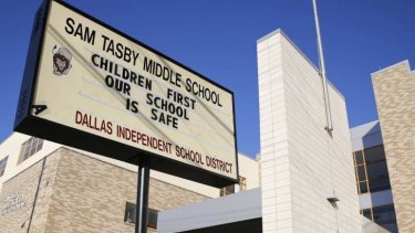 A school in Dallas where a student was removed after contact with Ebola patient Thomas Duncan attempts to reassure anxious parents.