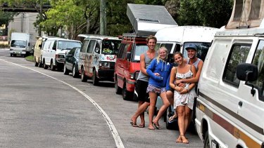 Fancied spot: German backpackers and their vans at Wentworth Park.