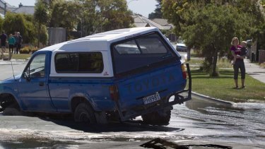 An earthquake in Christchurch caused a car to become stuck in silt on Broadhaven Ave in Parklands.