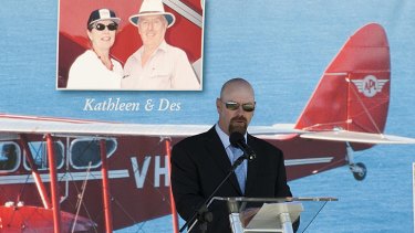 Scott Porter speaks at the memorial for his father, pilot Des Porter, and five others killed in a vintage plane crash.