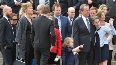 Opposition Leader Bill Shorten and two of his children outside the funeral service held for his mother Ann at the Xavier College Chapel, Melbourne.