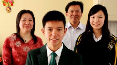 The support family... maths gold medallist Sampson Wong, 16, with his parents, Cecilia and Jimmy, and his older sister Samantha.