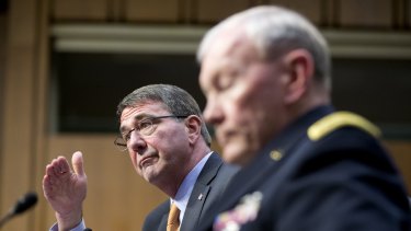 US Defence Secretary Ash Carter, left, testifies before the Senate Armed Services Committee on Tuesday, March 3, flanked by General Martin Dempsey, chairman of the Joint Chiefs of Staff.