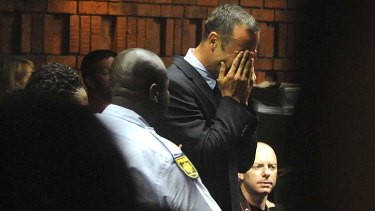 Remanded in custody ... Oscar Pistorius weeps in court in Pretoria.