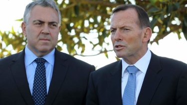 Prime Minister Tony Abbott and Treasurer Joe Hockey. Mr Abbott says Clive Palmer should respect the government's mandate and pass the budget.